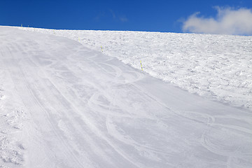 Image showing Empty ski slope at sun day