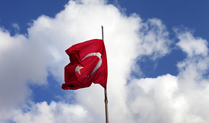 Image showing Turkish flag on flagpole waving in wind