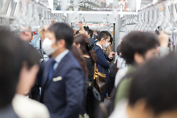 Image showing Passengers traveling by Tokyo metro.