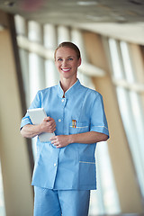 Image showing female doctor with tablet computer