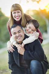 Image showing Young Mixed Race Family Portrait Outdoors