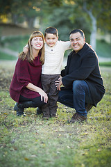 Image showing Young Mixed Race Family Portrait Outdoors