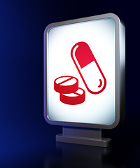 Image showing Medicine concept: Pills on billboard background