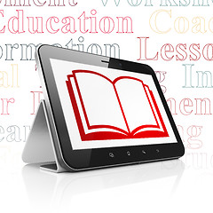 Image showing Education concept: Tablet Computer with Book on display
