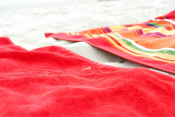 Image showing Beach towels on sand