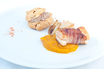 Image showing Typical Italian appetizer with liver pate and bacon