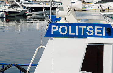 Image showing Police boat on a background of yachts