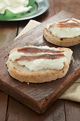 Image showing Italian bruschetta with bread calabrese, burrata cheese and anch