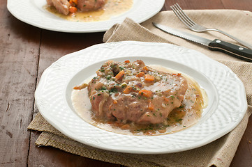 Image showing 
marrowbone, veal cut used in Italian cooking with yellow risott