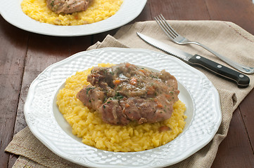 Image showing 
marrowbone, veal cut used in Italian cooking with yellow risott