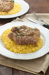 Image showing 
marrowbone, veal cut used in Italian cooking with yellow risott