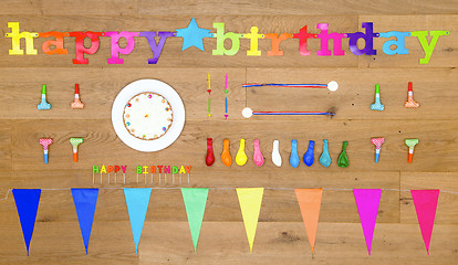 Image showing Birthday background items on wooden floor board