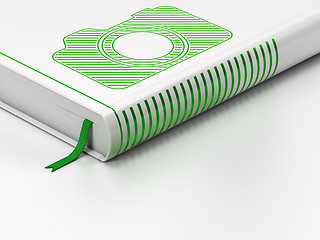 Image showing Tourism concept: closed book, Photo Camera on white background