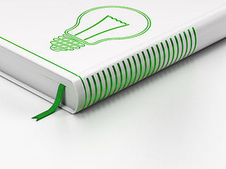 Image showing Business concept: closed book, Light Bulb on white background