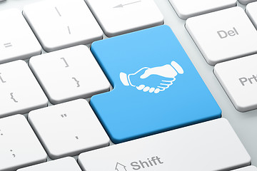 Image showing Business concept: Handshake on computer keyboard background