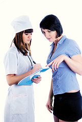 Image showing Patient and doctor prescribing medication