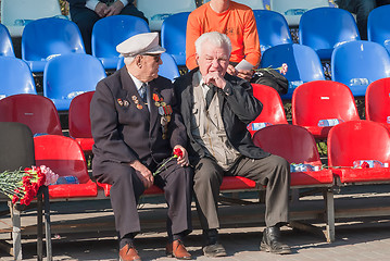 Image showing Senior veterans of World War II meet on tribunes