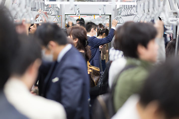 Image showing Passengers traveling by Tokyo metro.