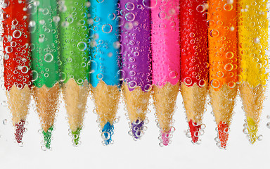 Image showing Pencils in water