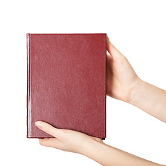 Image showing woman hands holding red book