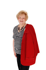 Image showing Smiling older woman standing.