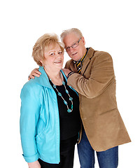Image showing Older man hugging his wife.