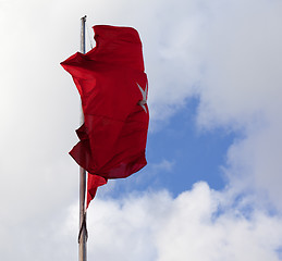 Image showing Turkish flag on flagpole waving in wind