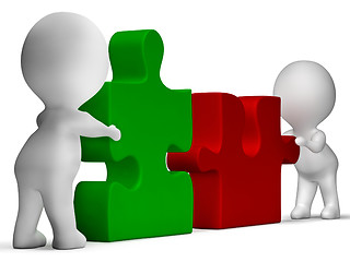 Image showing Jigsaw Pieces Being Joined Showing Teamwork And Collaboration