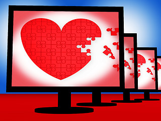 Image showing Puzzle Heart On Monitors Shows Love