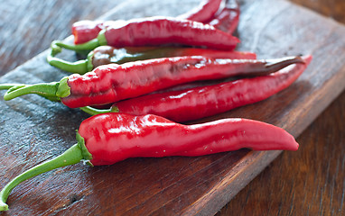 Image showing 
Spicy chilli on wooden table