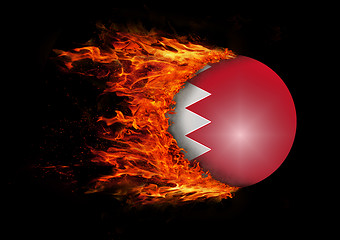 Image showing Flag with a trail of fire - Bahrain