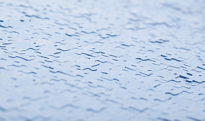 Image showing Connected blue puzzle pieces isolated