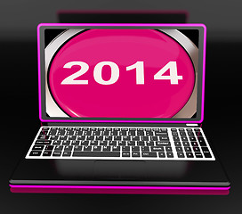Image showing Two Thousand And Fourteen On Laptop Shows New Year 2014