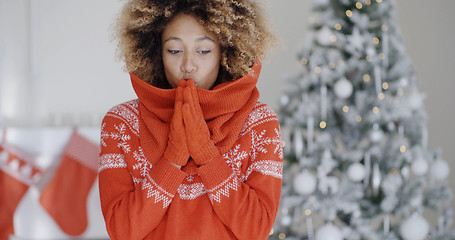 Image showing Young African woman celebrating Christmas