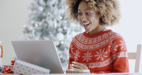 Image showing Excited happy young woman at Christmas