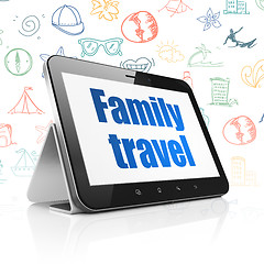 Image showing Vacation concept: Tablet Computer with Family Travel on display