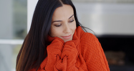 Image showing Woman cuddling down in her warm winter fashion