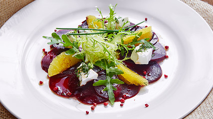 Image showing salad of red beets and feta cheese with olive oil