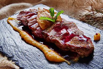 Image showing grilled meat, sliced duck