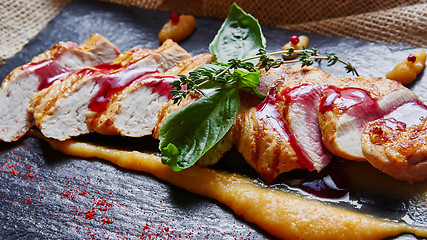 Image showing Grilled chicken breast with polenta