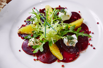 Image showing salad of red beets and feta cheese with olive oil