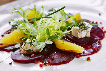 Image showing salad of red beets and feta cheese with olive oil