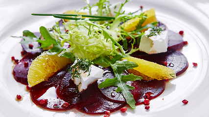 Image showing salad of red beets and feta cheese with olive oil