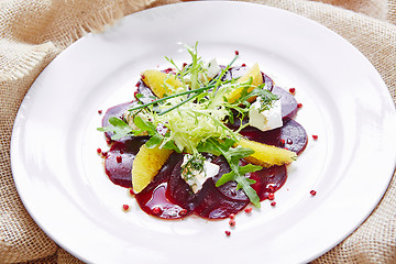 Image showing salad of red beets and feta cheese with olive oil