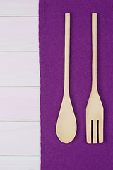 Image showing Kitchenware on purple towel