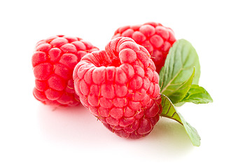 Image showing Ripe raspberry with leaf