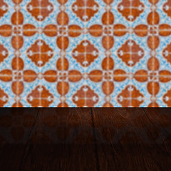 Image showing Wood table top and blur vintage ceramic tile pattern wall