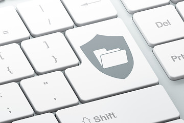 Image showing Finance concept: Folder With Shield on computer keyboard background