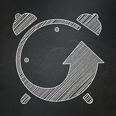 Image showing Time concept: Alarm Clock on chalkboard background