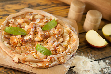 Image showing home made apple cake on the wooden table